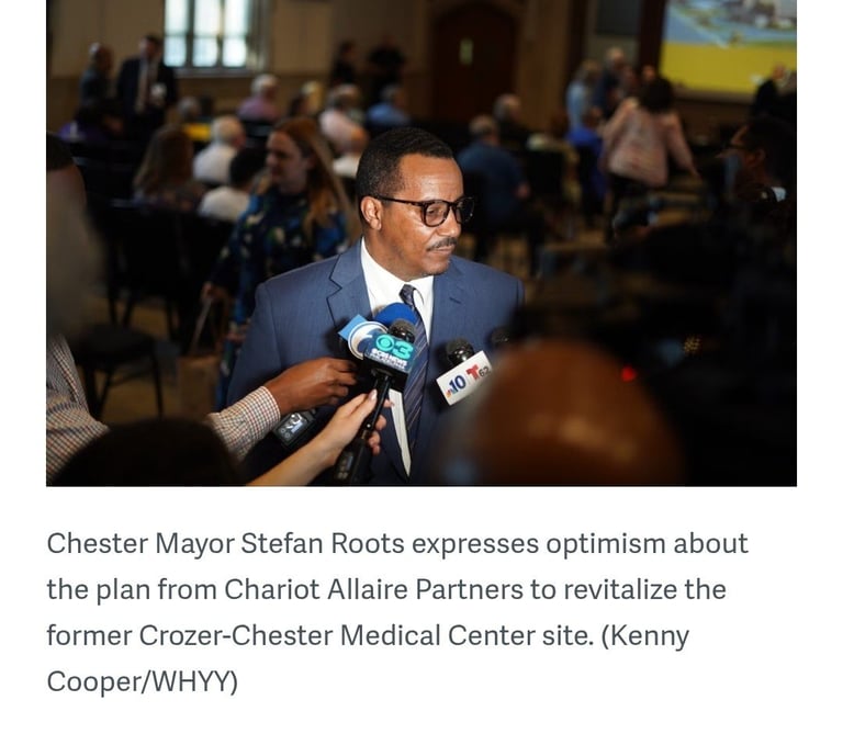 Chester Mayor Stefan Roots speaking to reporters at a press event about revitalizing the former Crozer-Chester Medical Center site